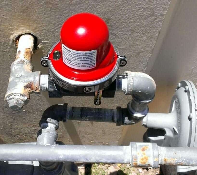 gas-installation-service-earthquake-shutoff-at-meter-orange-county Gas installation service in Orange County: residential gas meter with an earthquake shut-off valve installed on the outlet side