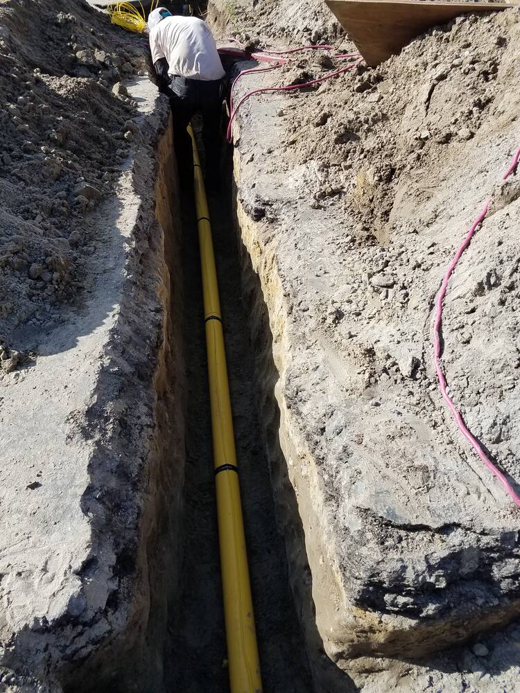 New polyethylene gas line in a trench on a Newport Beach property