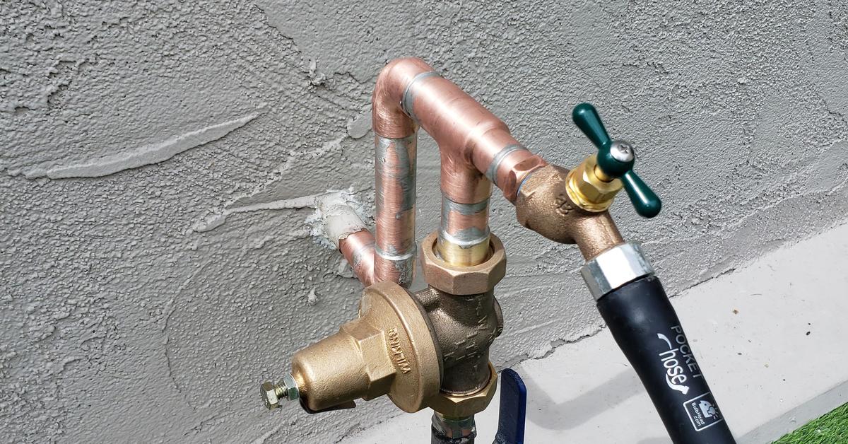 Costa Mesa plumbing repair on a residential water pressure regulator and copper supply line