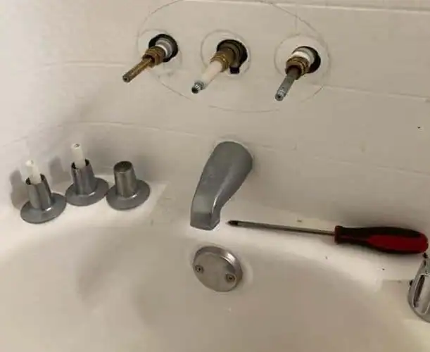 Huntington Beach fixture installation a three-handle tub and shower valve. Huntington Beach fixture installation a three-handle tub and shower valve.